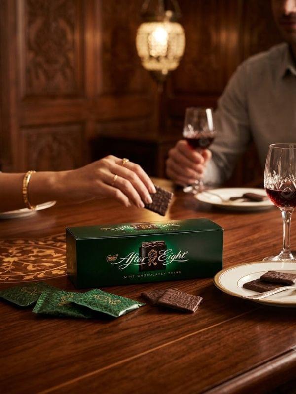 Nestle After Eight Dark Chocolate Mints 300G with smooth chocolate texture in festive packaging.