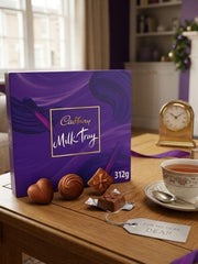 Cadbury Milk Tray 312g in a glossy British gift box.