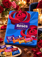 Cadbury Roses tin with colorful wrapped sweets, a British Christmas chocolate tin.