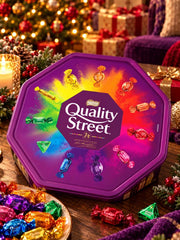 Nestle Quality Street tub with bright wrapped sweets, a British chocolate assortment.